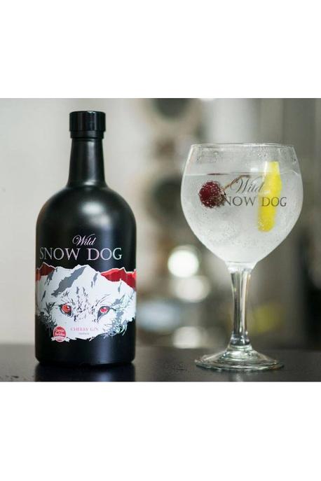 Wild Snow Dog Cherry Gin 42% 700ml with a glass